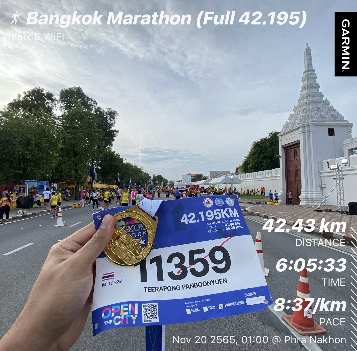 Finisher medal with my bib from the Bangkok Marathon 2022