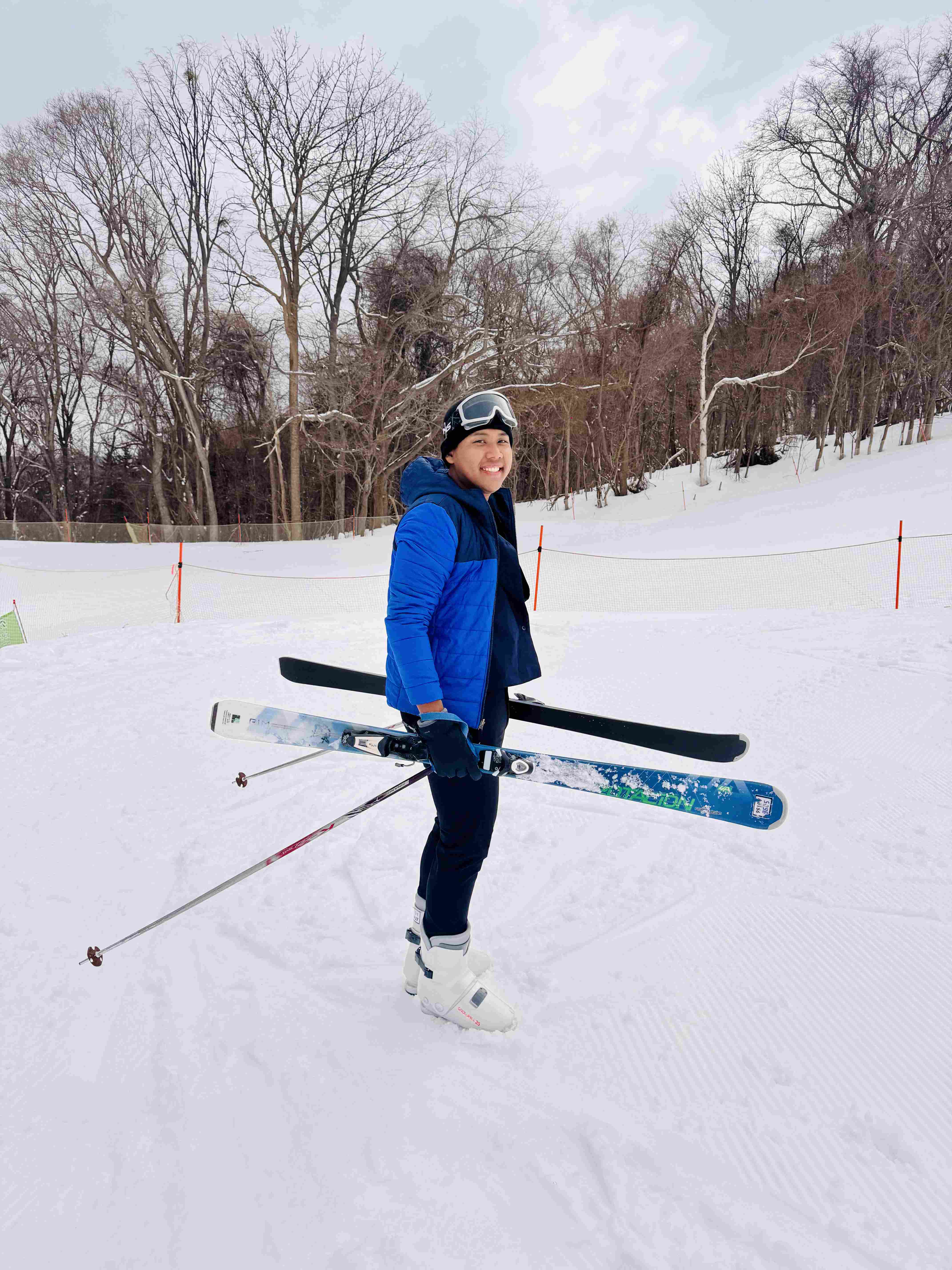 Putting on ski boots for the first time