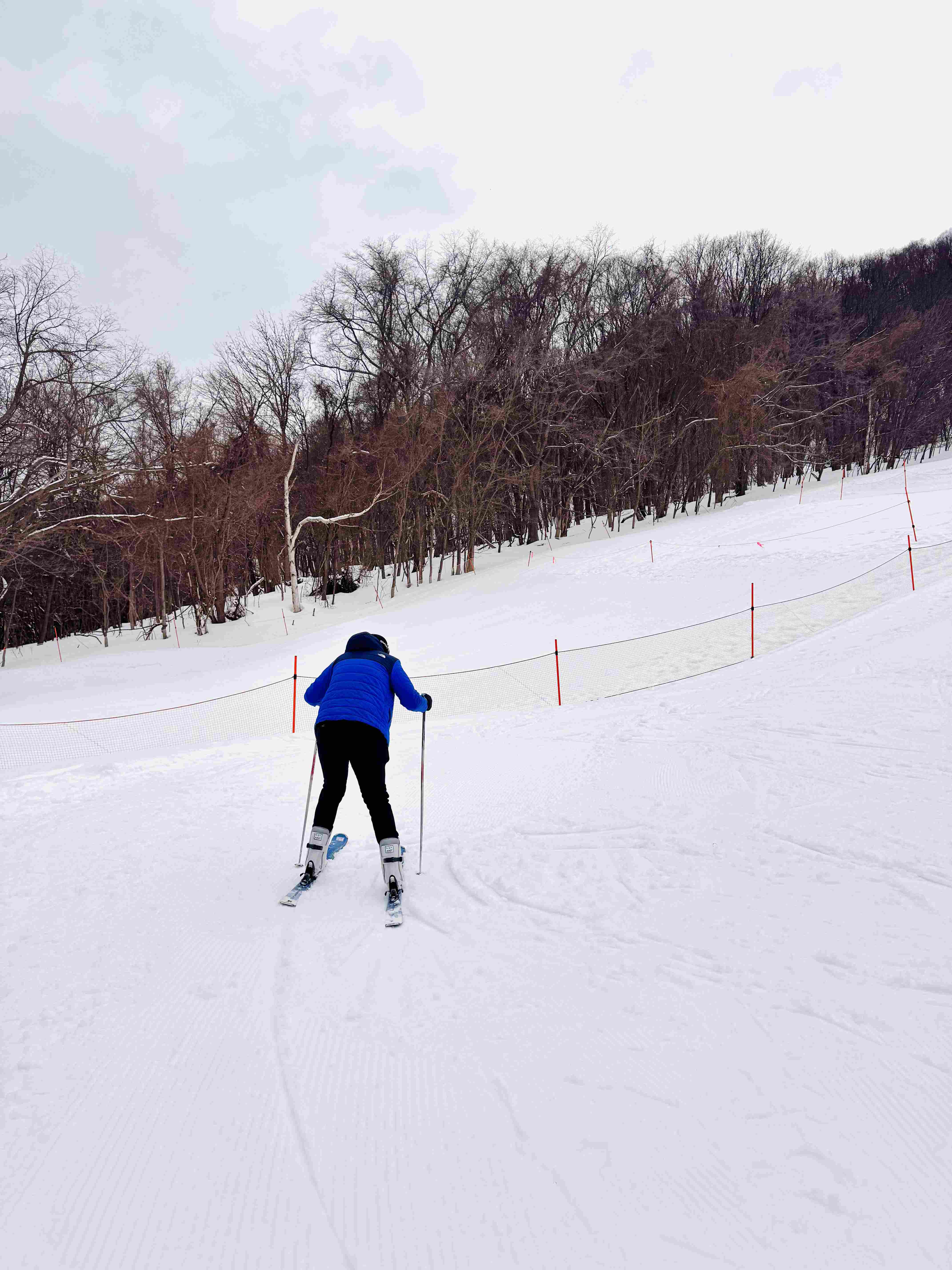 Sliding down beginner slope