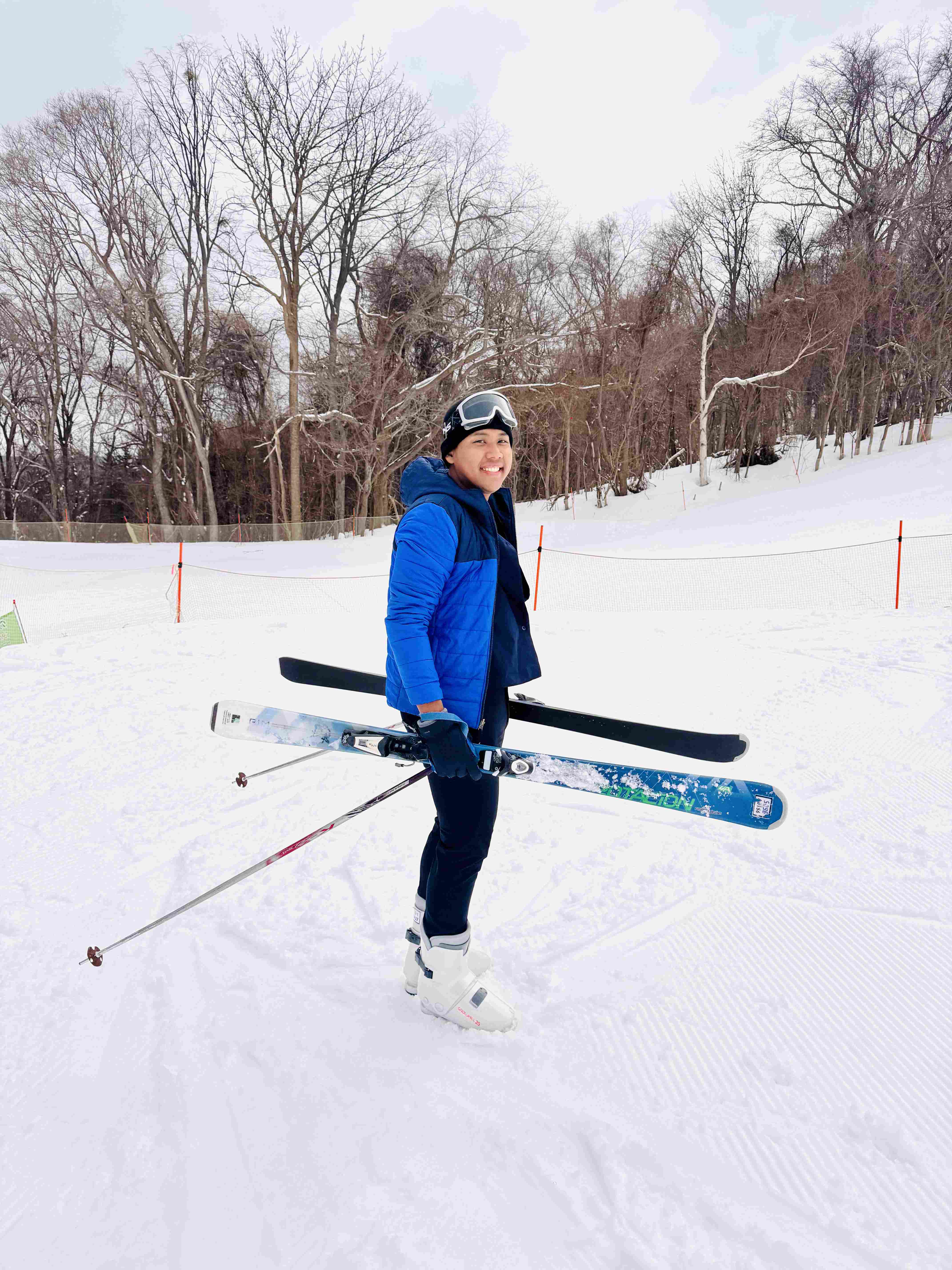 Putting on ski boots for the first time